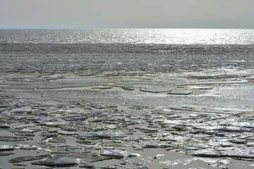 Drifting ice at the coast in the winter, melting ice  © trinetuzun