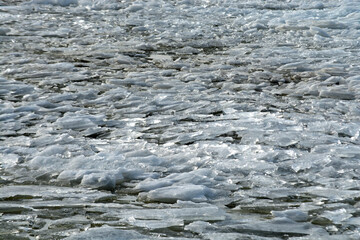 Drifting ice at the coast in the winter, melting ice 