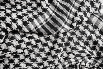 Saudi men s national headdress called Ghutrah. Traditional tissue black and white arabic man's head scarf Shemagh (Keffiyeh). Close up textile background.