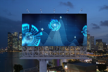 Information flow hologram on road billboard, night panorama city view of Singapore. The largest...