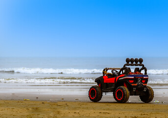 A Remote Toy Car is parking on the Shore of Mandarmani Beach