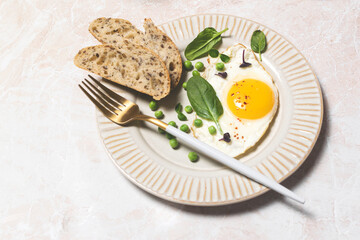 Healthy egg breakfast with spinach and microgreens