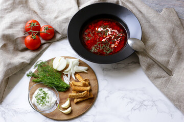 Russian traditional dish borscht and onion with bread