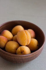 Naklejka na ściany i meble apricots in a bowl