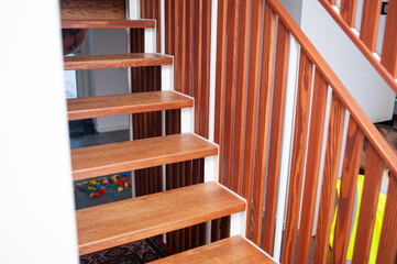 Wooden handrails with stairs in the interior