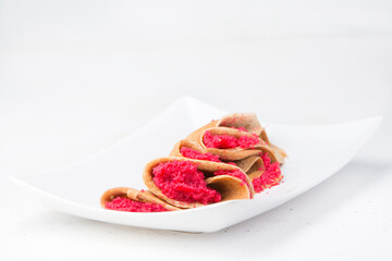 Blinis (crepes with red caviar typical of the Russian carnival)