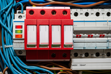 Surge arrester used to protect the electrical system in the building during electrical discharges,...