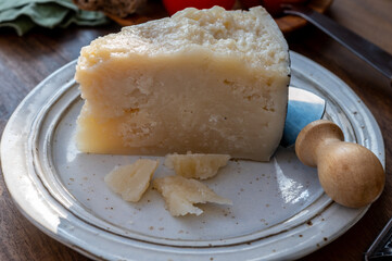 Cheese collection, aged hard Italian sheep cheese black pecorino from Sicily island or pecorino nero di Sicilia.