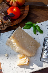 Cheese collection, aged hard Italian sheep cheese black pecorino from Sicily island or pecorino nero di Sicilia.