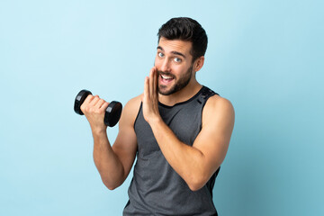 Fototapeta na wymiar Young sport man with beard making weightlifting whispering something