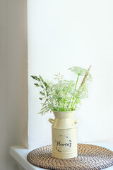 Wild grass and flowers in vase on white background. Beautiful atmosphere romantic floral composition. summer season