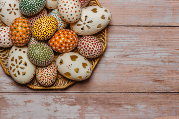 Colorful Easter Egg banner.Above view with copy space.Happy Easter decoration background,colorful hand painted decorated eggs.Festive tradition for Eastern European countries.Holiday Still life photo.