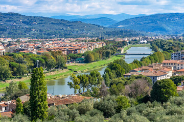 Fototapeta na wymiar Arno River bridges, Florence, Tuscany, Italy. Bridge originally built in 1200's.