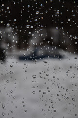 drops on the glass of the house window