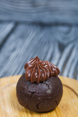 Potato cake. Decorated with chocolate cream.