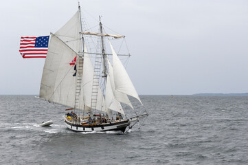 Fototapeta na wymiar Amazing Grace is an 83 foot topsail schooner and sets a square topsail on the foremast and seven fore and aft sails. She is based out of Gig Harbor, Washington.