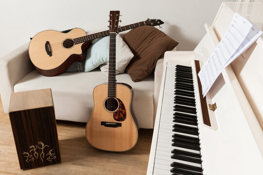 acoustic guitar with piano and cajon