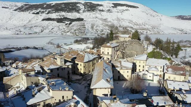 Pescocostanzo, a delightful village in Abruzzo covered in snow
Mountain town with snow. Aerial shot with drone