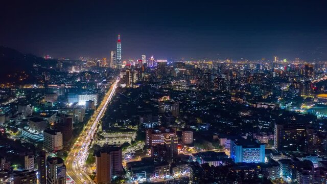 taipei cityscape night time illuminated traffic road junction rooftop aerial panorama 4k timelapse taiwan