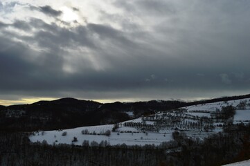 winter landscape of mountains and hills in the snow