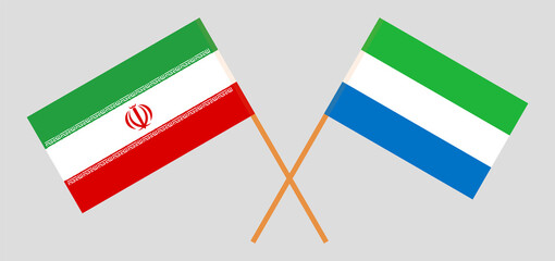 Crossed flags of Iran and Sierra Leone. Official colors. Correct proportion