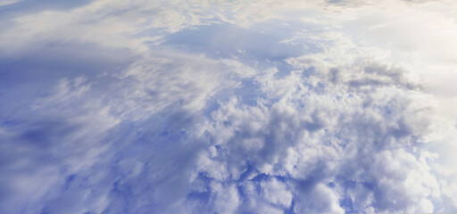 Aerial view of the sky in the clouds in the sunlight.