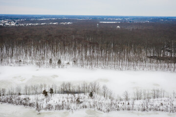 Fototapeta na wymiar Aerial of Snow Covered Plainsboro Homes Farmland