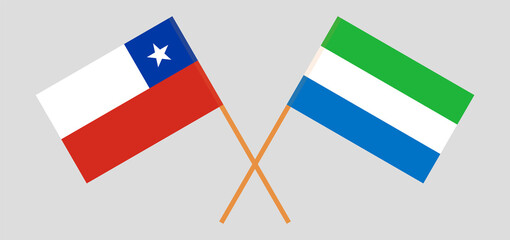 Crossed flags of Chile and Sierra Leone. Official colors. Correct proportion