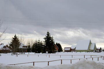 houses on the mountain in the snow