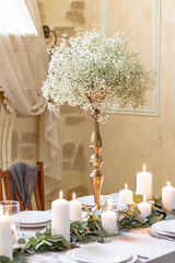 romantic wedding diner with candles in a restaurant
