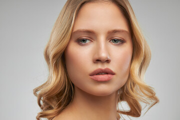 Fototapeta premium Pretty lady with clear skin posing with no makeup.