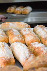 Craft bread on the table at the bakery. The concept of small industries and healthy food