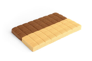 Chocolate and creamy toffee candy squares isolated on white background.