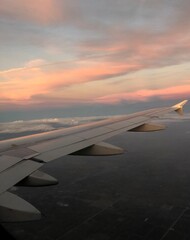 Fototapeta na wymiar Sunset on the plane 