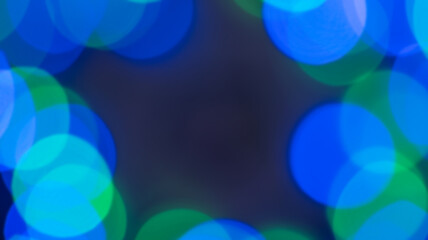 multicolored festive bokeh out of focus, suitable for text in the foreground