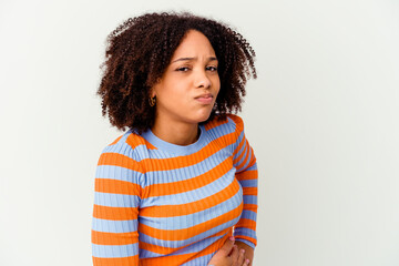 Young african american mixed race woman isolated having a liver pain, stomach ache.