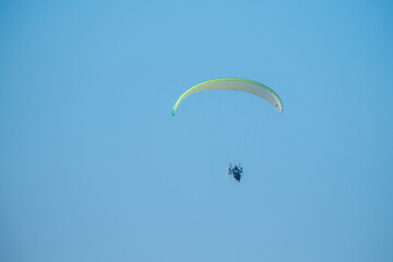 Man flying with powered parachute