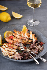 Seafood assorted platter - Prawn Shrimp, Squid, Octopus mini, lemon with glass of wine