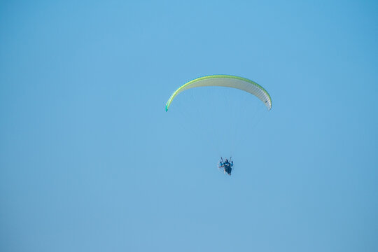 Man flying with powered parachute