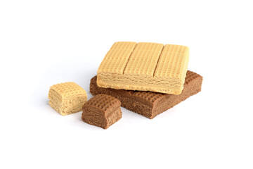 Chocolate and creamy toffee candy squares isolated on white background.