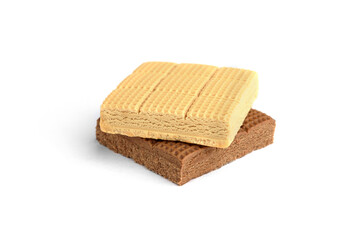 Chocolate and creamy toffee candy squares isolated on white background.