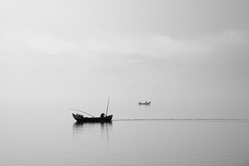 Obraz premium Traditional fishing boats during toil