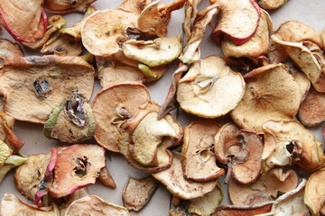 Dried apples on vintage style. Food background.