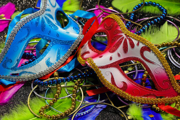 Red And Blue Carnival Masks With Feathers And Jewelry © JJ van Ginkel