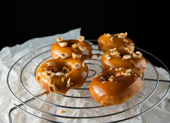 Donuts with caramel and nuts