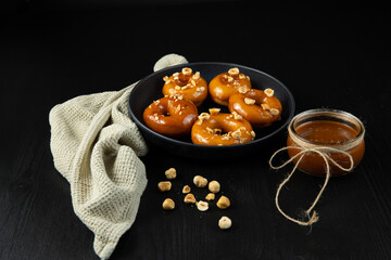 Donuts with caramel and nuts