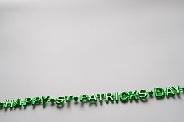 Happy St. Patrick's Day spelled out in green letters on white background