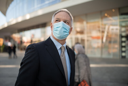 Portrait Of A Covid Coronavirus Masked Businessman