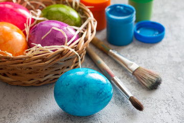 Hand painted easter eggs, paints and brushes