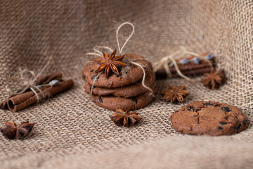 cookies with chocolate and spices on the background of sackcloth,